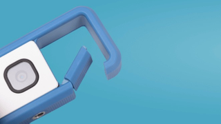 Illustration for article titled Canon Stuck a Smartphone Lens Into a Flash Drive for This Tiny Clip-on Camera